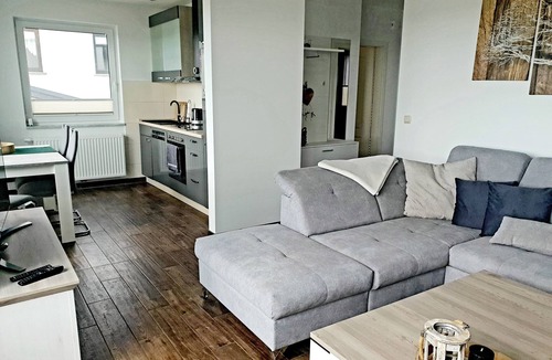 Ziemitz Condo | Modern vacation apartment with balcony directly on the Peene
