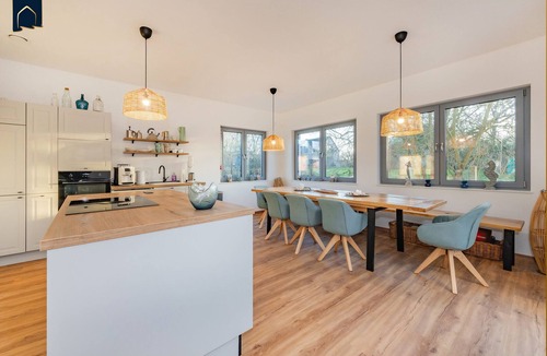 Usedom House | Modern vacation home "Haffhus" for up to 10 people with garden and balcony