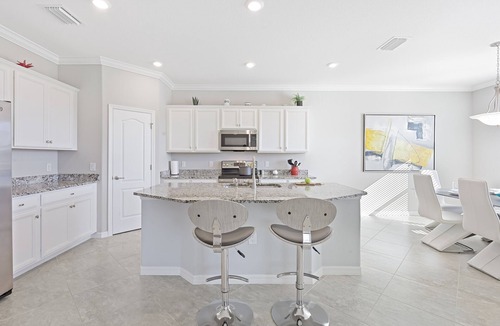 Naples House | Modern Waterfront Home in Artesia | Pool/Gym