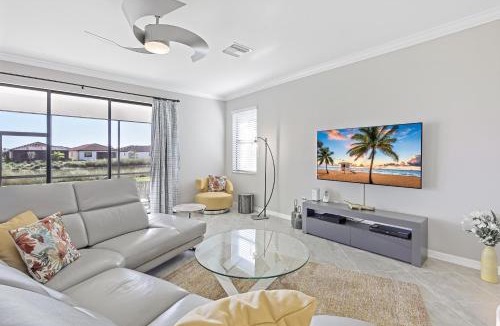 Naples House | Modern waterfront home in Artesia with pool/gym
