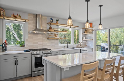 Whitewater House | Modern Whitewater Lake Retreat on Private Cove with Views Screened Porch