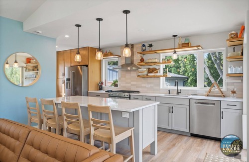 Whitewater House | Modern Whitewater Lake Retreat on Private Cove with Views Screened Porch