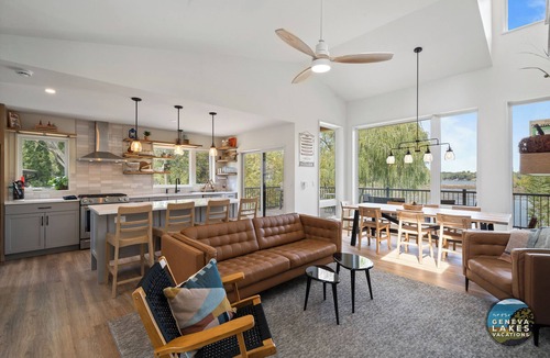 Whitewater House | Modern Whitewater Lake Retreat on Private Cove with Views Screened Porch