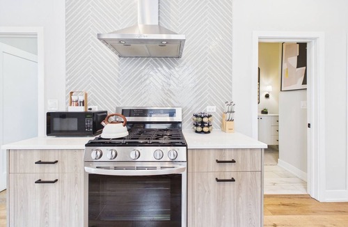 West Town Apartment | Modern Zen 2BR: Quiet Stay & Free Parking