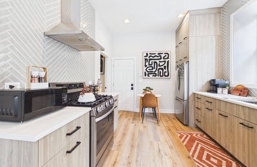West Town Apartment | Modern Zen 2BR: Quiet Stay & Free Parking