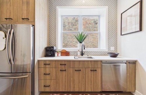 West Town Apartment | Modern Zen 2BR: Quiet Stay & Free Parking