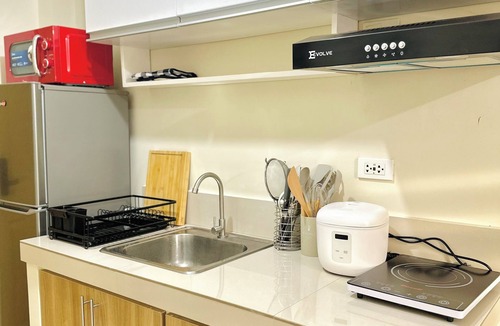 Dumaguete Condo | Modest Condo Getaway, Sea & City Access