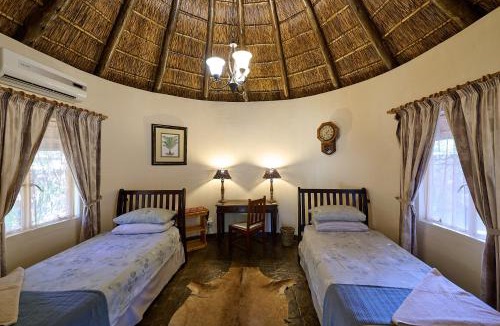 Gaborone Cabin | Mokolodi Backpackers - Relax in Nature near Gaborone with Pool, Fast WiFi, Coworking Space & Garden Chalets - Tranquillity Redefined