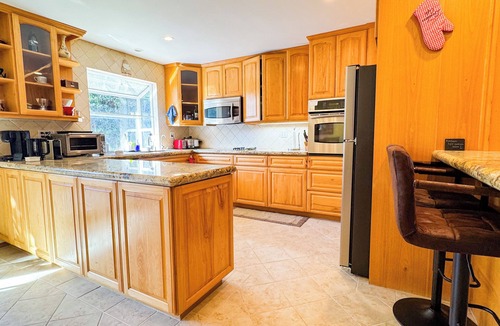 Carpinteria House | Monthly discount! Bright 2 bd+office w/hot tub, AC, patio, laundry, & more!