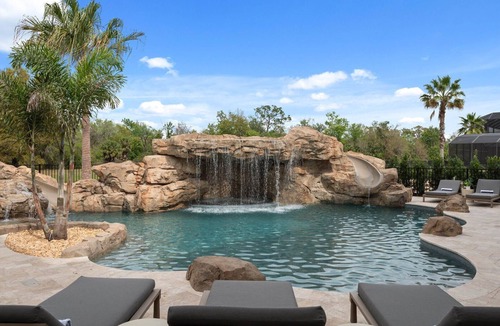 Reunion House | Morlando Three floor rocket ship, luxurious interior, back yard oasis with pool