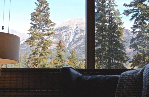 Canmore Condo | Mountain + Creek View. 5 Min Walk To Main Street. An Amazing Home Base!