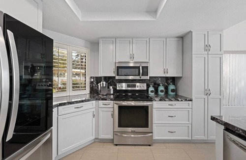 La Quinta Condo | Mountain & Golf Views + Pool & Spa + Fire Pit + BBQ + Golf Cart + Dog Friendly!