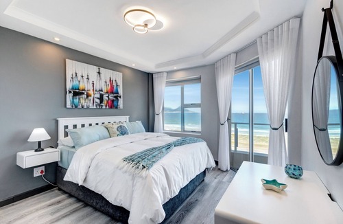 Bloubergstrand Apartment | Mountain Tide Beachfront Apartment Table Mountain & Ocean Views with Pool & BBQ