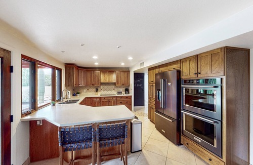 The Foothills House | Mountain view escape with an enclosed yard, pool, hot tub, grill, & AC - dogs ok