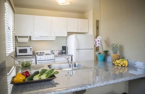 Wailua Hotel | Mountain View Suite w/Balcony & Kitchen | Outdoor Pool | Steps from the Beach