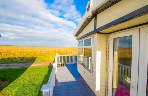 Camber RV Rental | MP124 - Camber Sands Holiday Park - Sleeps 6 - Full Decking - Beautiful Marsh Views