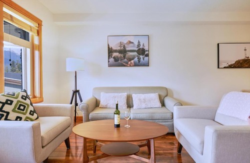 Canmore Apartment | Mtn View Escape with King Size Bed with Outdoor Pool - Banff Pass Included!