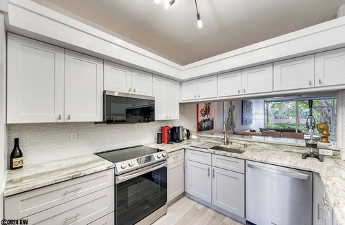 Imperial Golf Estates Condo | NAPLES 2B/2B IMPERIAL CONDO W/STYLE & LAKE VIEWS! POOLS! NEAR EVERYTHING! 102
