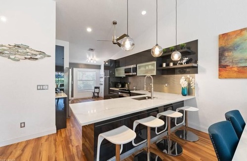 Crown Pointe Villa | Naples Modern Oasis is 4 miles to 5th Avenue South shopping & dining