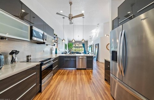 Crown Pointe Villa | Naples Modern Oasis is 4 miles to 5th Avenue South shopping & dining