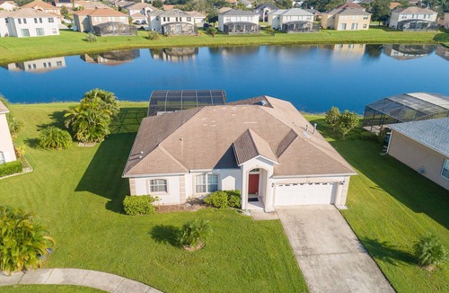 Crescent Lakes House | Near Disney Luxury Lakeside Villa with Spa and Wireless Internet