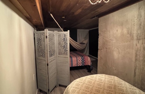 Merritt House | Nestled into the mountains, relax under the star in the hot tub
