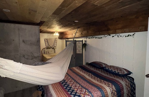 Merritt House | Nestled into the mountains, relax under the star in the hot tub