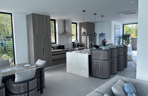Blue Hills Villa | New BEACHFRONT Aqua Blu Villa-4 King Bdrm/6 Bath-Oceanfront bliss-up to 8 guests