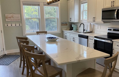 Corolla Light Condo | New Beachside Villa: Steps to Sand, Dog-Friendly, 2BR Gem!
