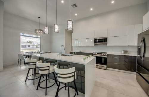Mariner House | NEW BUILD - Heated Pool - Spa - Wide Canal - Southern Exp - Upgraded BBQ -4 Beds