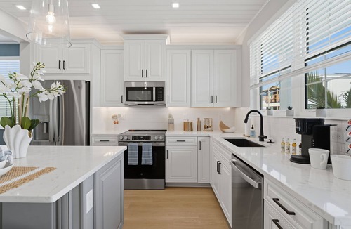 Cortez House | ⚓New Listing Discounts! Canal Home-Heated Pool, Game Room, Tesla Charger, & More⚓