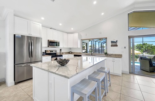 Connors House | New Listing! Dockside Dream-3 Premium Kings! Heated Salt Pool, On the Water, Walk to the Beach!