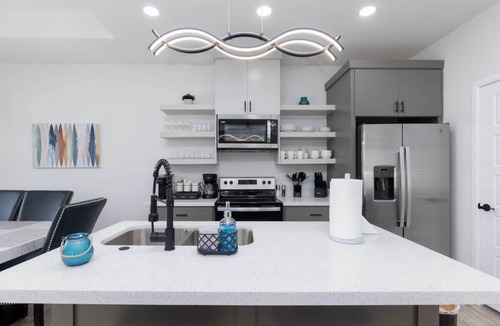 Harlingen House | New Luxury Poolside Escape w/Tesla Parking/Charger
