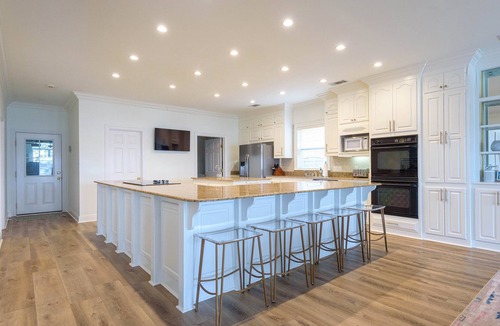 Oscar House | New on the rental market! Lakefront on False River with private dock and pool