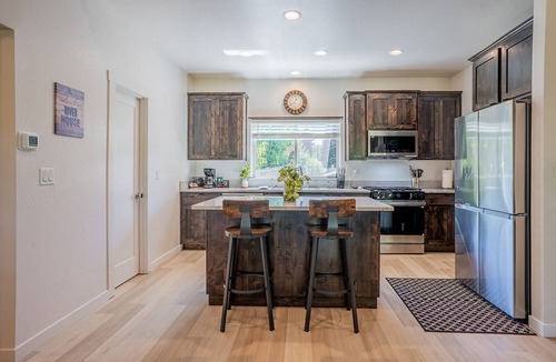 Grants Pass House | New Riverfront Home on 1 Acre - WiFi, Covered Deck