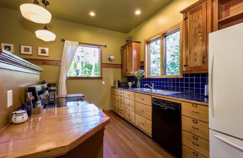 Bigfork House | New! Spacious 5BR Forest Lodge | Picture Windows, Fireplaces, Game Room & Peaceful Montana Setting