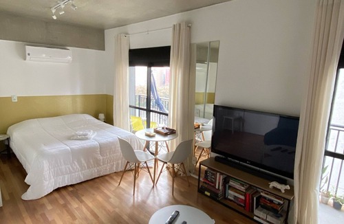 Consolacao Apartment | New Studio next. Paulista with vacancy, gym, balcony and movie screen!