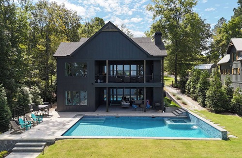 Buckhead House | NEW Stunning Lakefront Heated Pool Spa Game Room Putting Green Dock