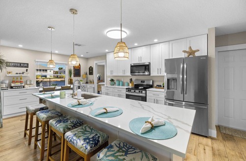 Spring Hill House | NEW! Waterfront Gulf Retreat w/Heated Pool, Spa, & Mini Golf.