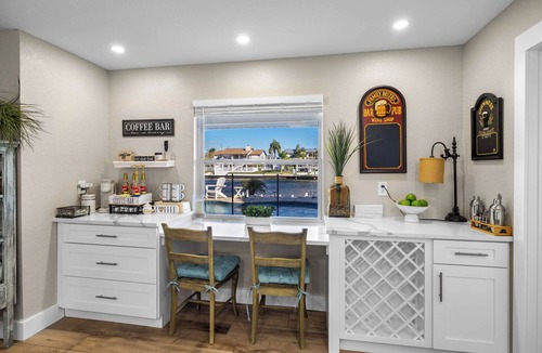 Spring Hill House | NEW! Waterfront Gulf Retreat w/Heated Pool, Spa, & Mini Golf.