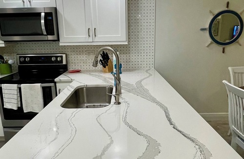 Jupiter Bay Condo | Newly Available Jupiter Bay Condo 3rd Floor Views of Ponds hosted by A&E Hosts!