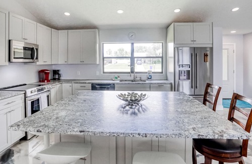 Placid Lakes House | Newly renovated lakefront home with private dock, screened lanai, & W/D