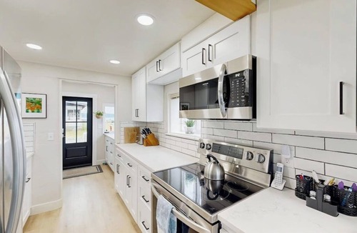 Bow House | Newly renovated waterfront home on Samish Island with firepit