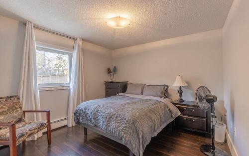 Yellowknife House | NHP YK B&B - Large Deck- Hot Tub - Massage chair and seasonal swimming pool- Free parking - Pet friendly