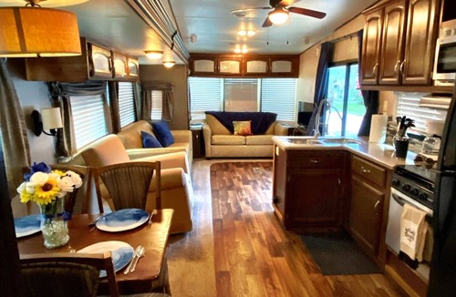 Milton RV Rental | Nice 40’ RV with all modern conveniences, (full kitchen, bathroom, separate bedroom), in private Resort/campground, pool, hot tub, sauna, clubhouse available to all guests.