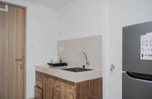 Pondok Aren Apartment | Nice and Homey Studio at Bintaro Embarcadero Apartment By Travelio
