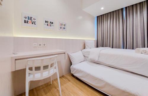 Bumi Serpong Damai Apartment | Nice and Spacious 2BR with Extra Room at Branz BSD City Apartment By Travelio