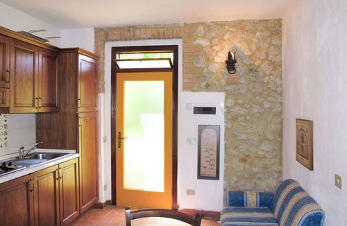 Monteriggioni Villa | Nice apartment in villa for 3 guests with WIFI, pool, TV, patio and pets allowed