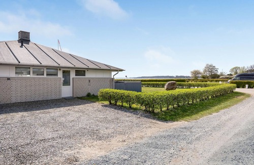 Hejsager Strand Apartment | Nice cottage at the end of a street with sea view.