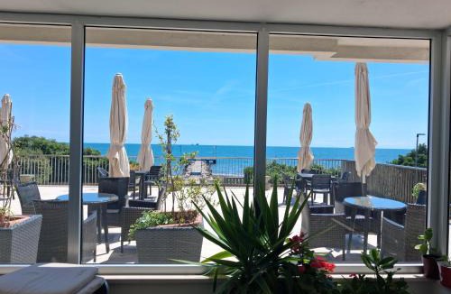 Santa Maria in Stelle Apartment | Nice flat on the beach front with private beach spot included